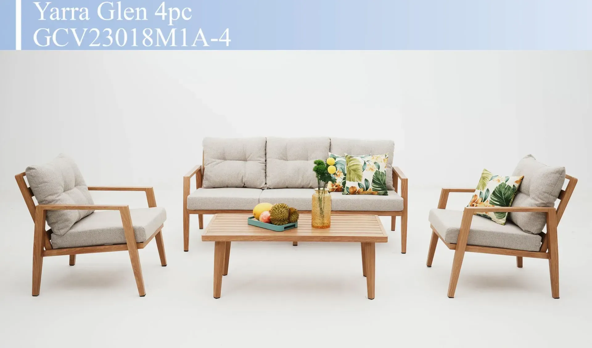 Beige patio furniture set with two armchairs, sofa, and coffee table on white background