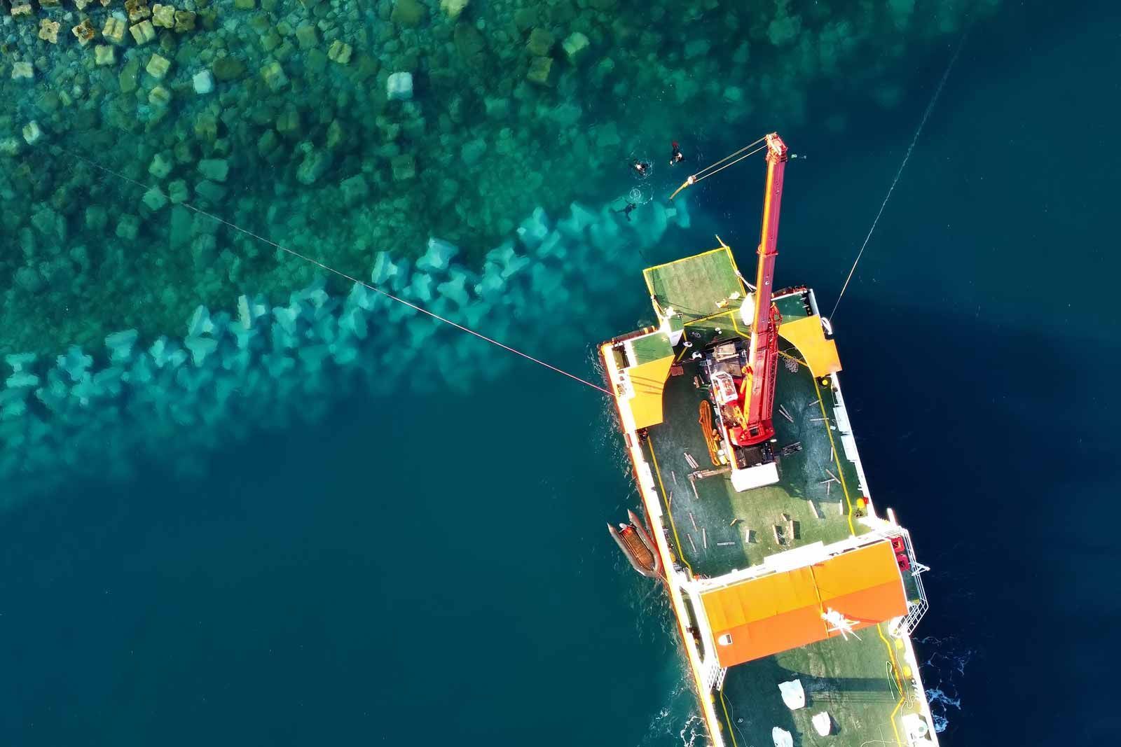 Pontoon barge supporting marine construction work on an Australian waterway