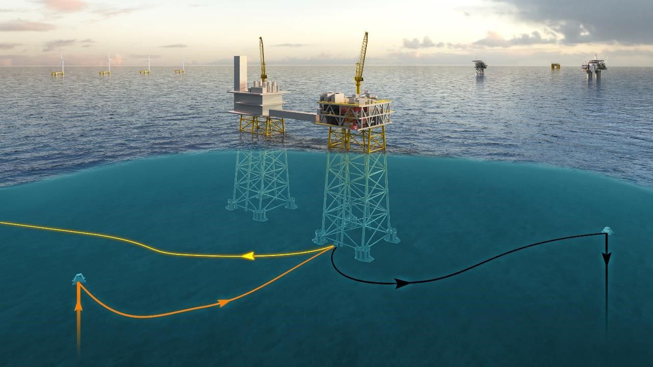 An artist 's impression of an oil rig in the ocean.