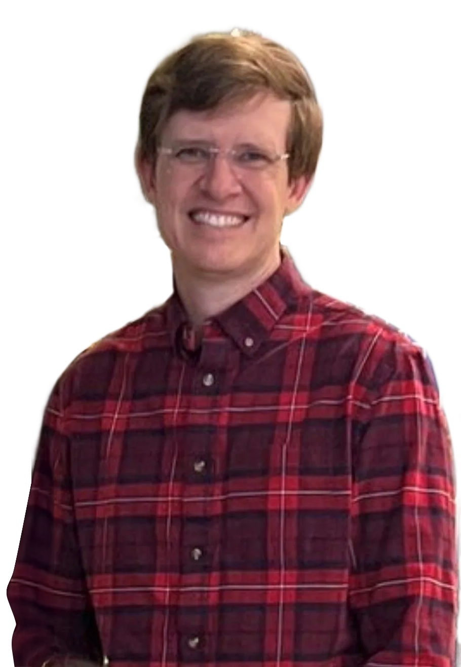 Smiling person in a red plaid shirt against a white background