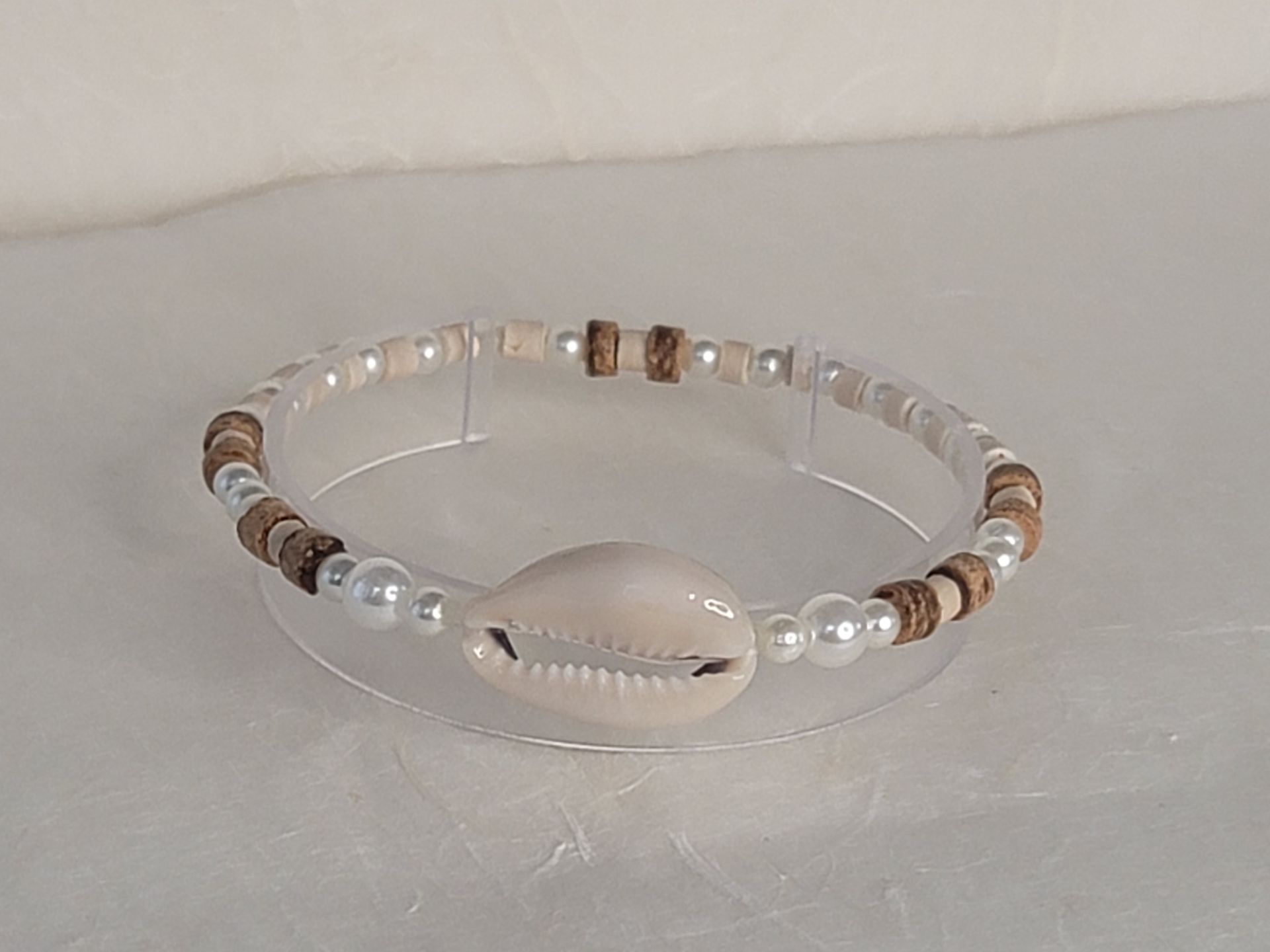 Simulated Pearl and Cowrie Shell Bracelet – A Timeless Symbol of Strength & Prosperity