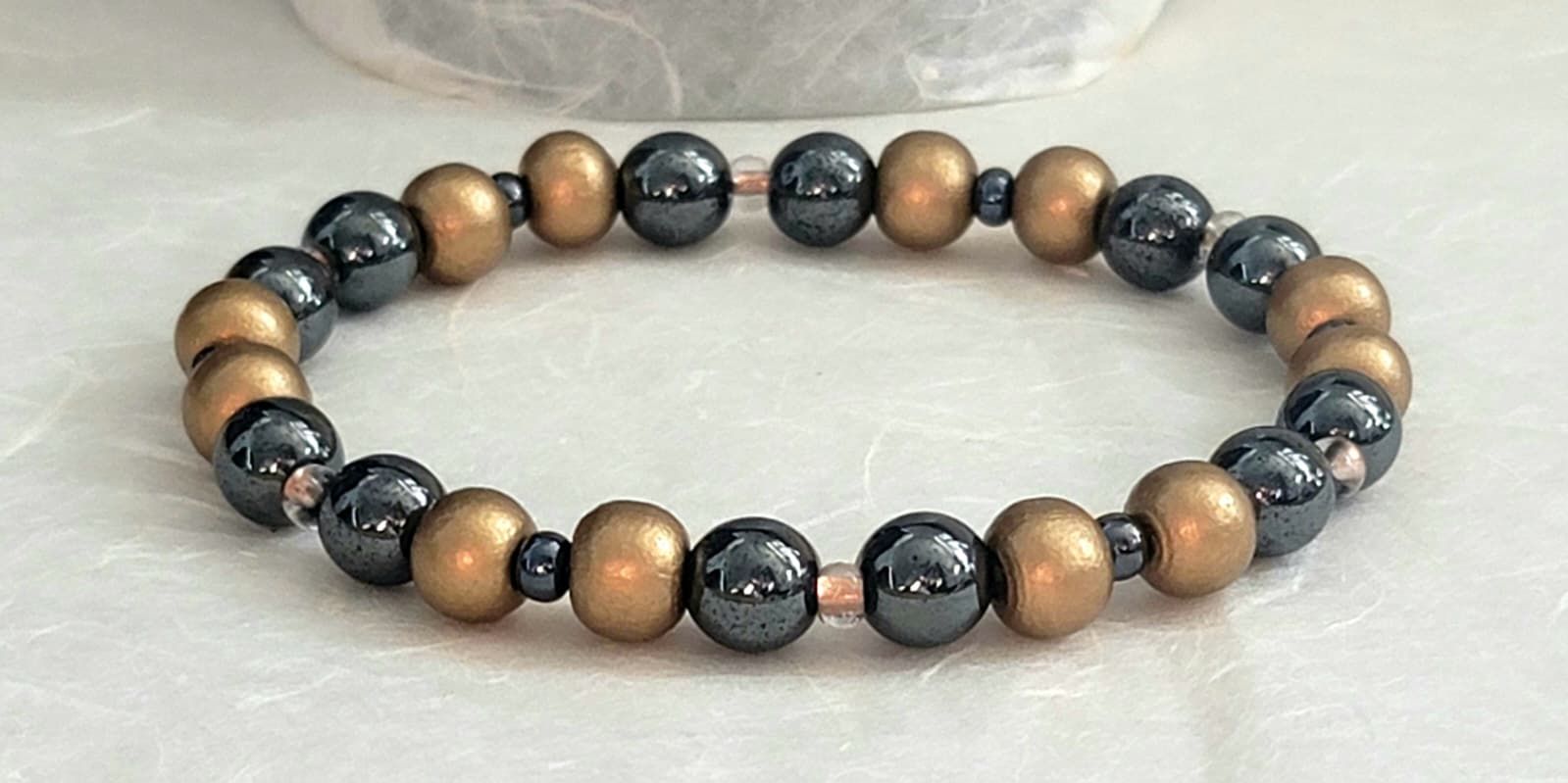 Hematite Stone and Gold Accent Bracelet