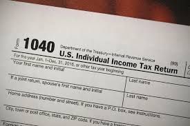 Close-up of a U.S. Individual Income Tax Return 1040 form on a desk.