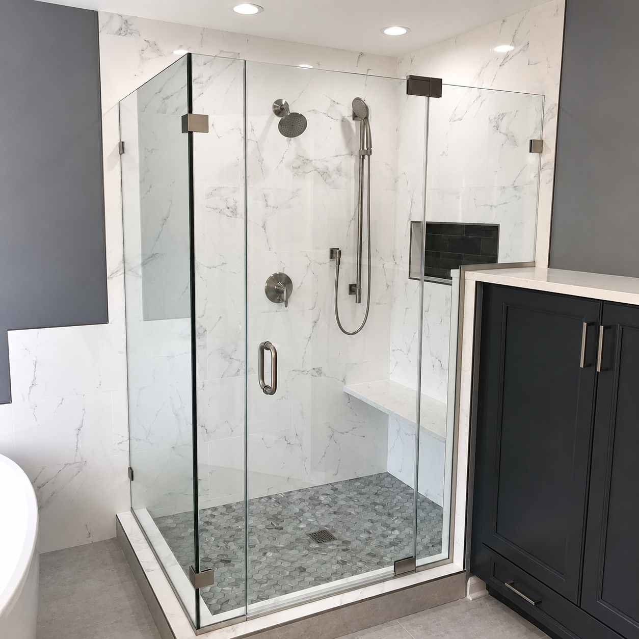 Bright marble bathroom with glass shower, freestanding tub, and large window