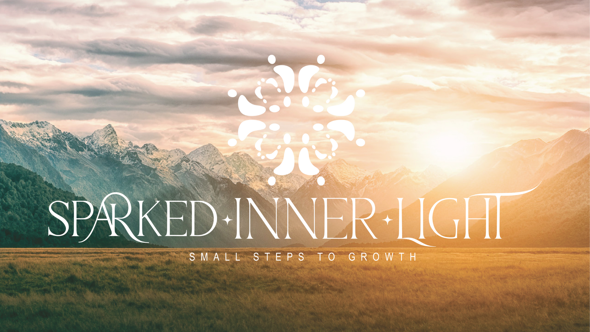 A logo for sparked inner light with a mountain in the background
