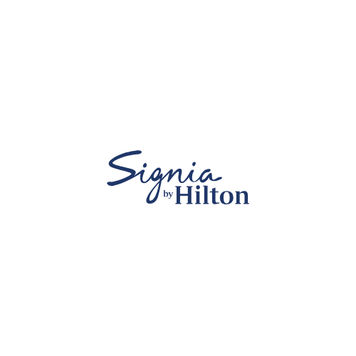 Signia by Hilton logo, navy blue script font on a white background.