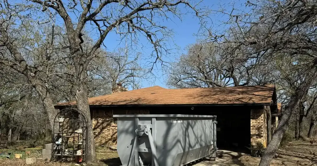 roll-off dumpster rental delivered to residential driveway in China Spring TX