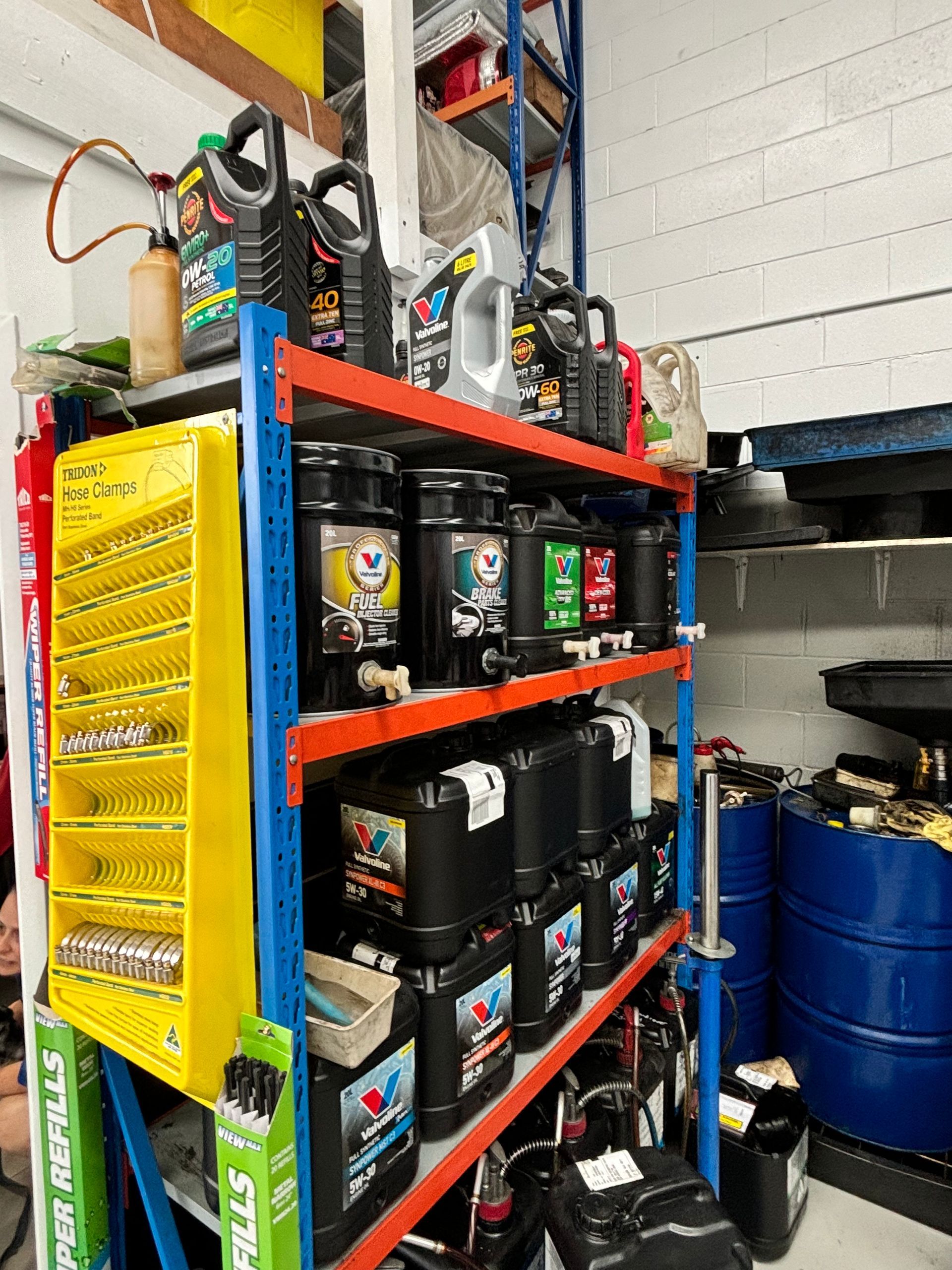 A warehouse filled with lots of different types of oil. — Sure Stop Automotive Centre In Nerang, QLD