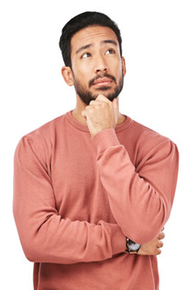 Man in coral sweater, looking upwards with hand on chin, appears to be thinking.