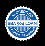 Blue and white SBA 504 Loan Accredited Lender Program seal.