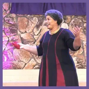 Renee Speaking on Stage