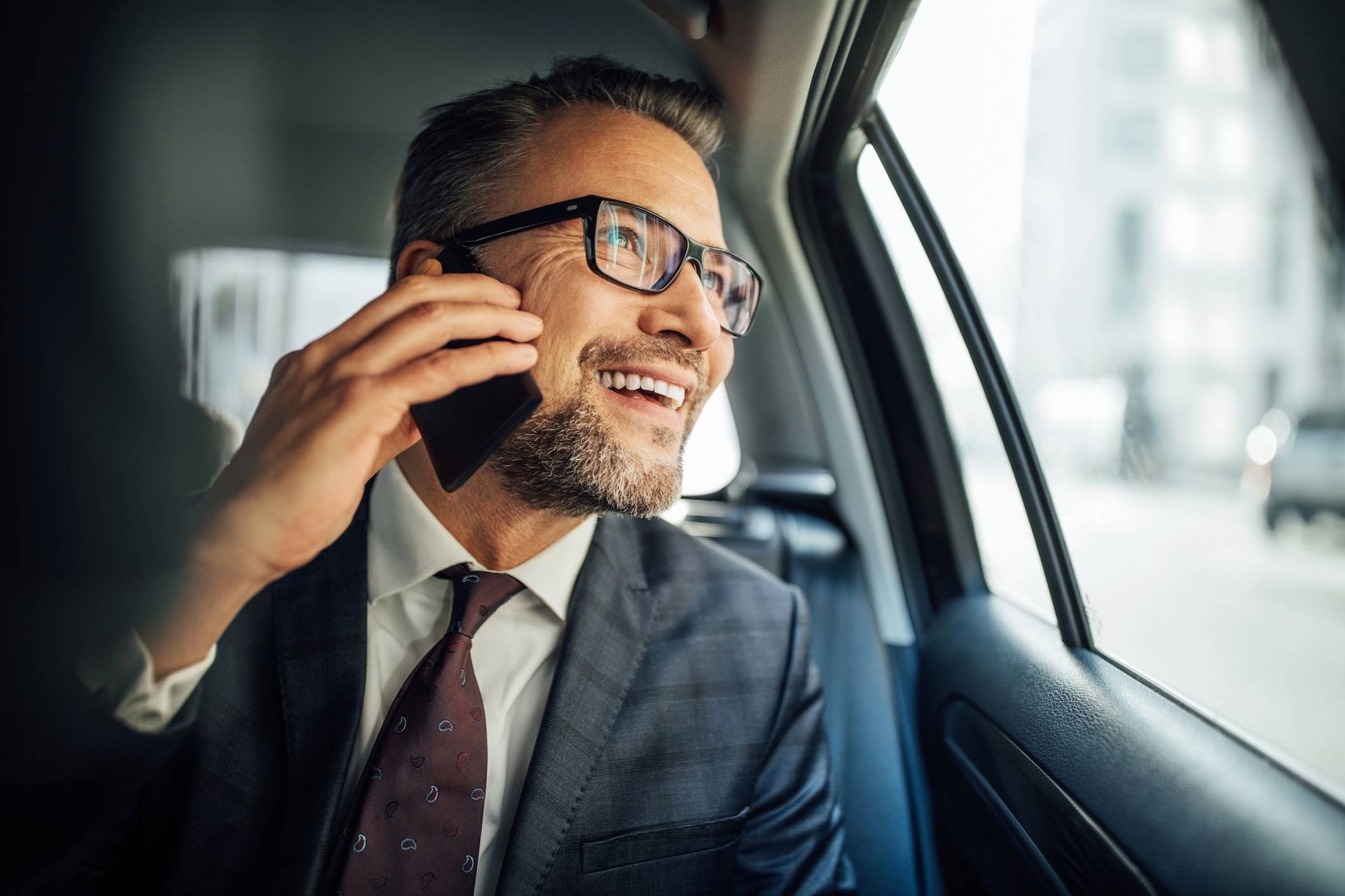 Entrepreneur Using Phone — Latrobe, PA — Veterans Cab Inc