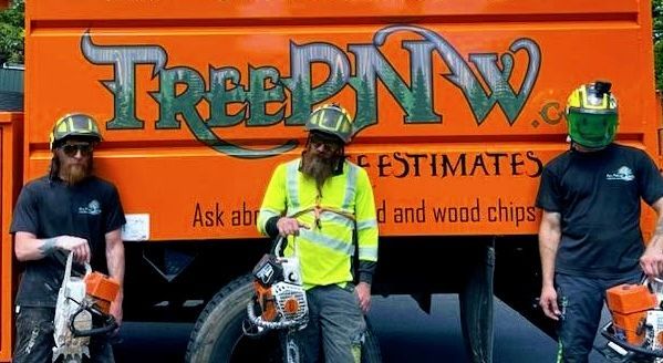 Three workers in safety gear stand in front of an orange TreeBNW truck with a wood chipper.