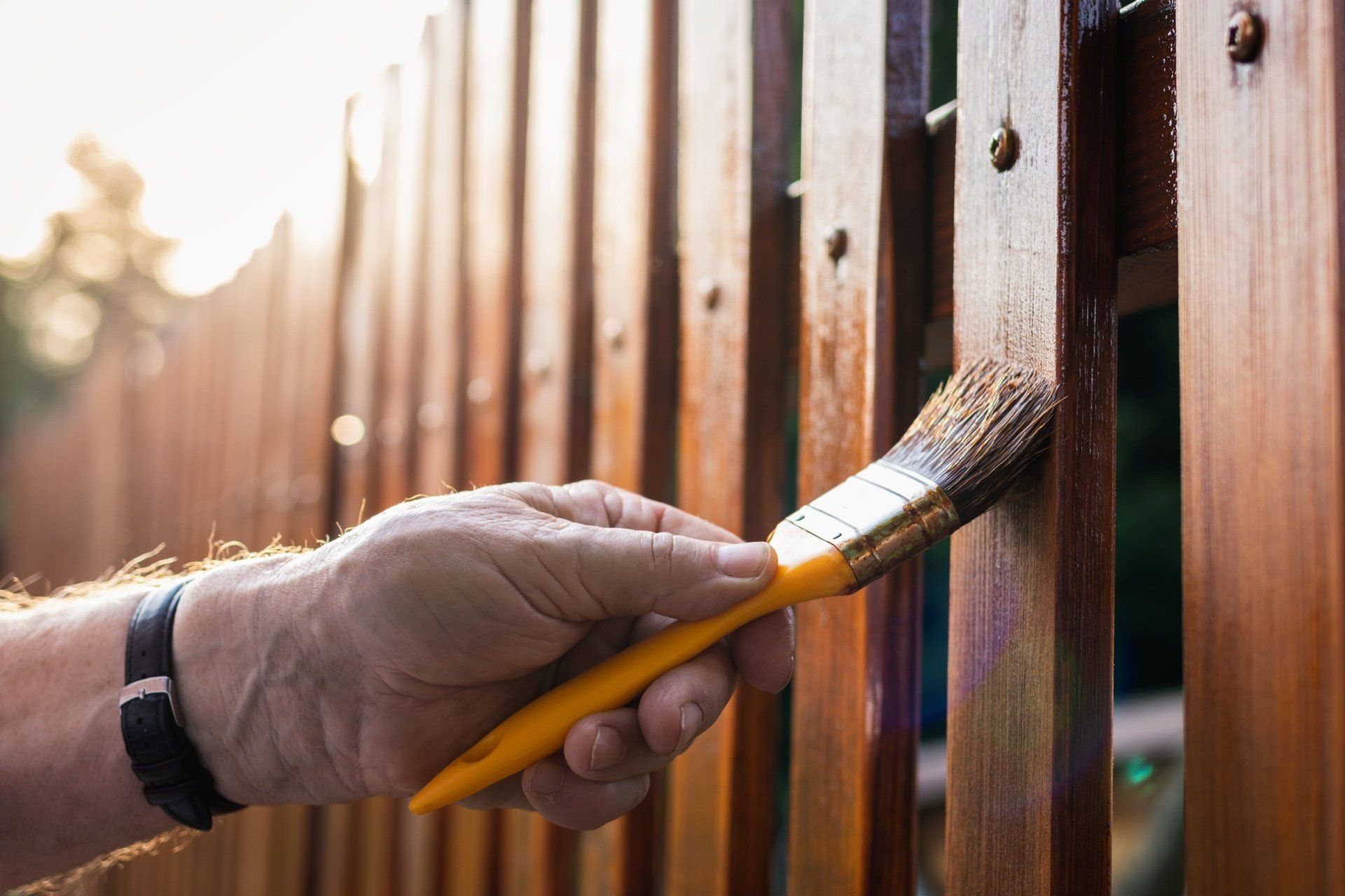 Person staining fence