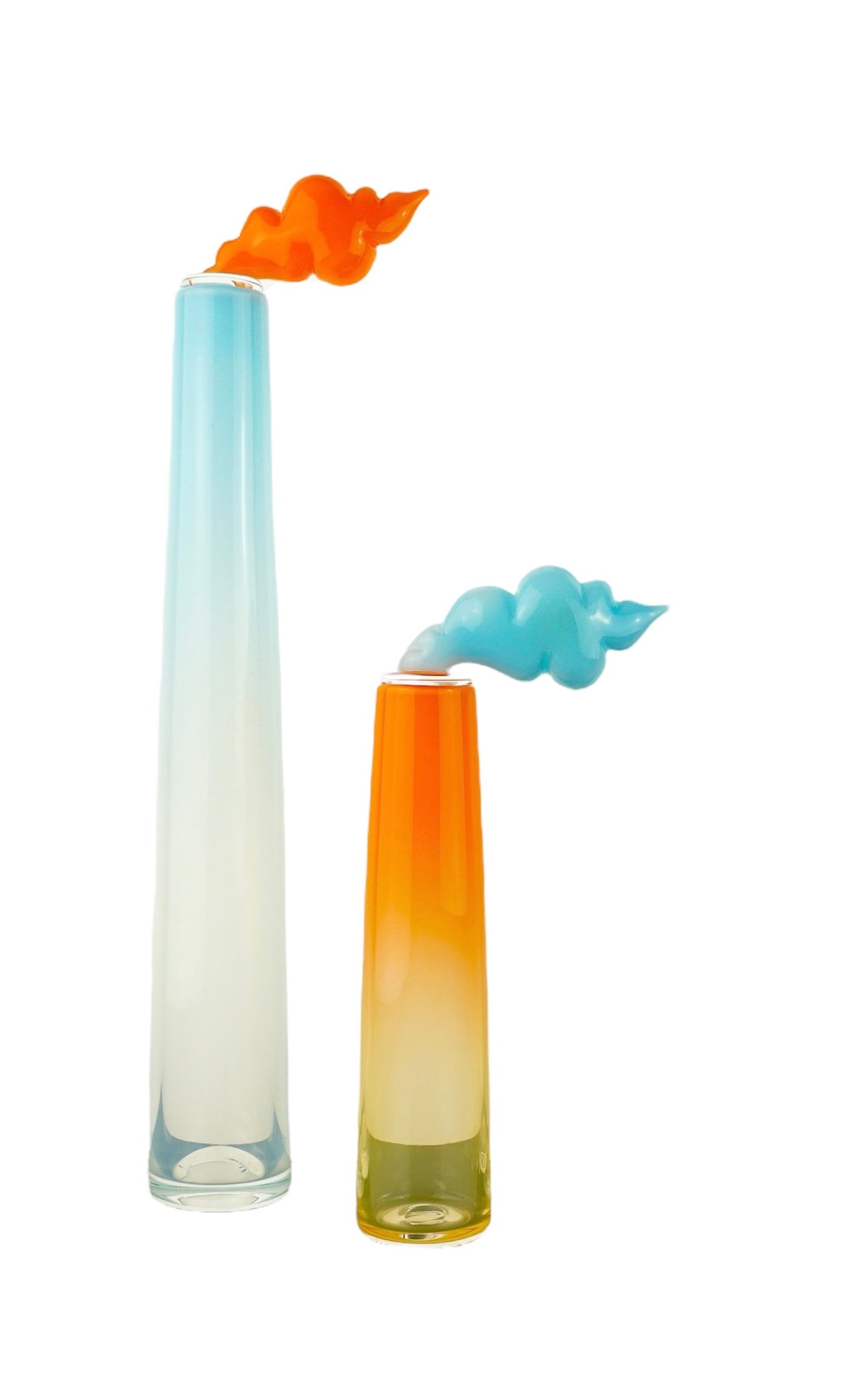 Two tall, colorful glass vases, one blue and one orange, each with a cloud-shaped top.
