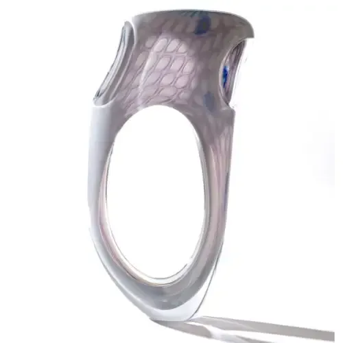 Abstract, translucent, ring-shaped sculpture; light gray and purple hues, with a geometric pattern in the center.