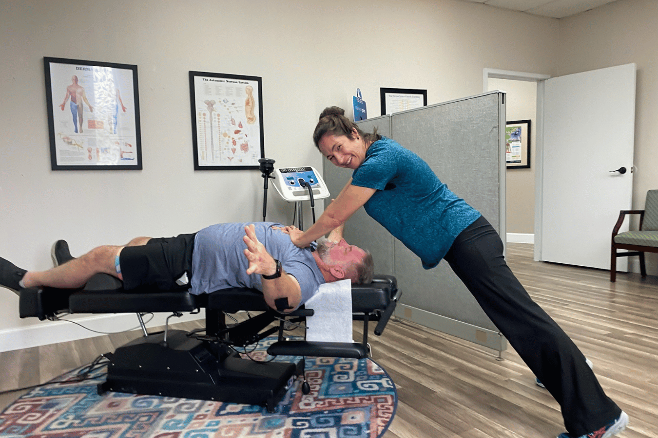 Athlete receiving a chiropractic adjustment at Champion Chiropractic of Pasadena in Pasadena, TX.