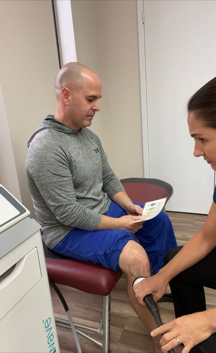 Patient receiving a gentle spinal adjustment at Champion Chiropractic of Pasadena in Pasadena, Texas