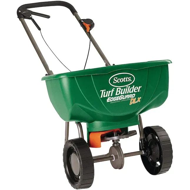 A green scotts turf builder is shown on a white background