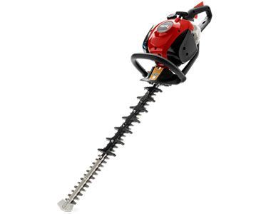 A red and black hedge trimmer on a white background.