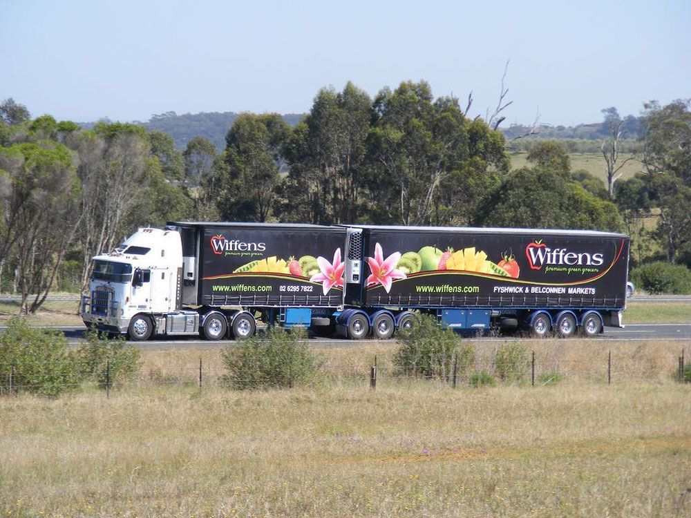 One Truck Transporting Two Containers — Joe Camilleri Transport in Sydney, ACT