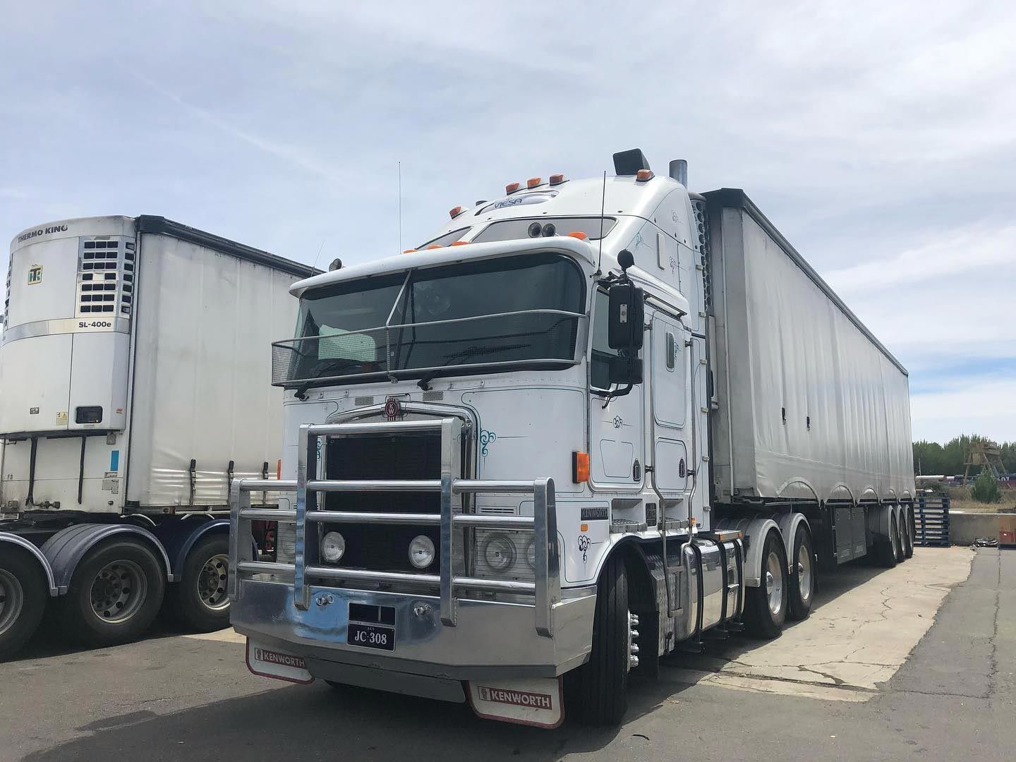 White Transport Truck Running on The Road — Joe Camilleri Transport in Fyshwick, ACT