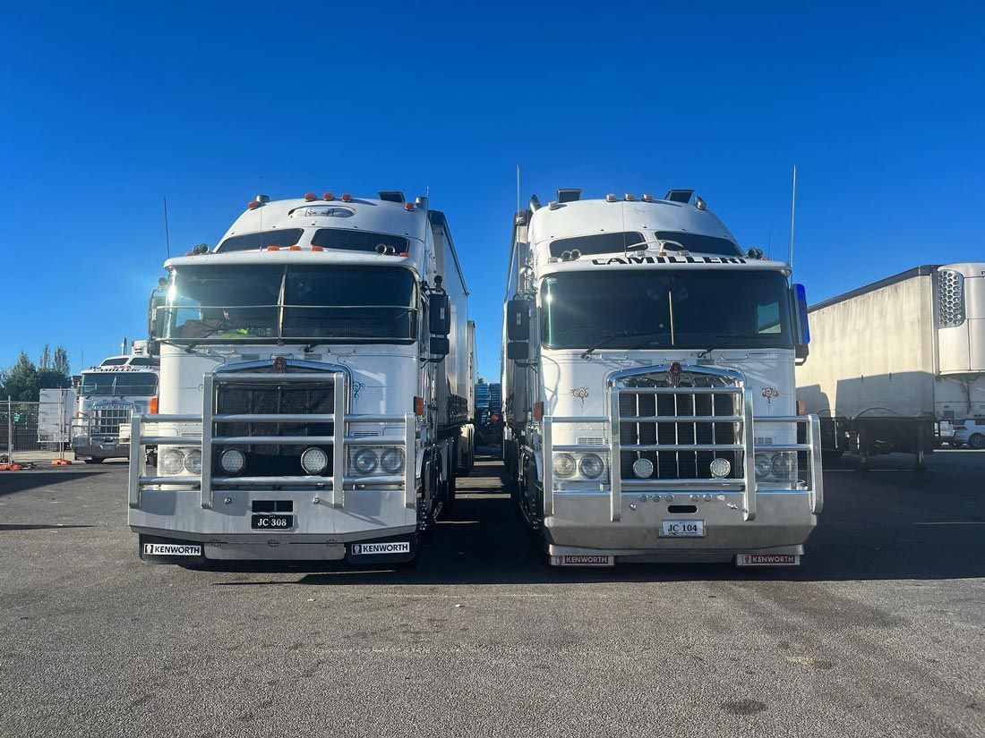 Front View of Two Transport Trucks Parked — Joe Camilleri Transport in Fyshwick, ACT