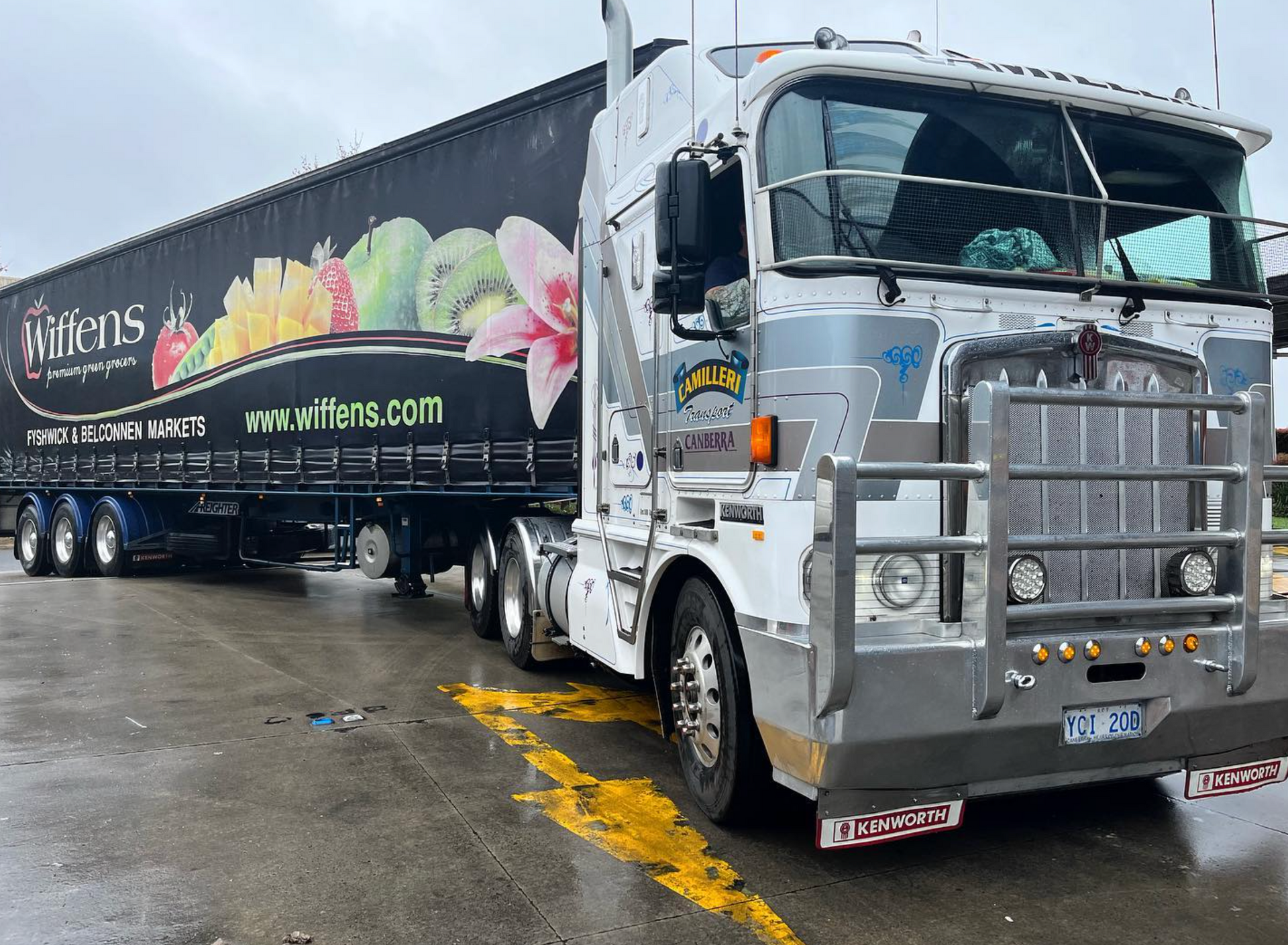 Man Standing Beside Transport Truck — Joe Camilleri Transport in Fyshwick, ACT