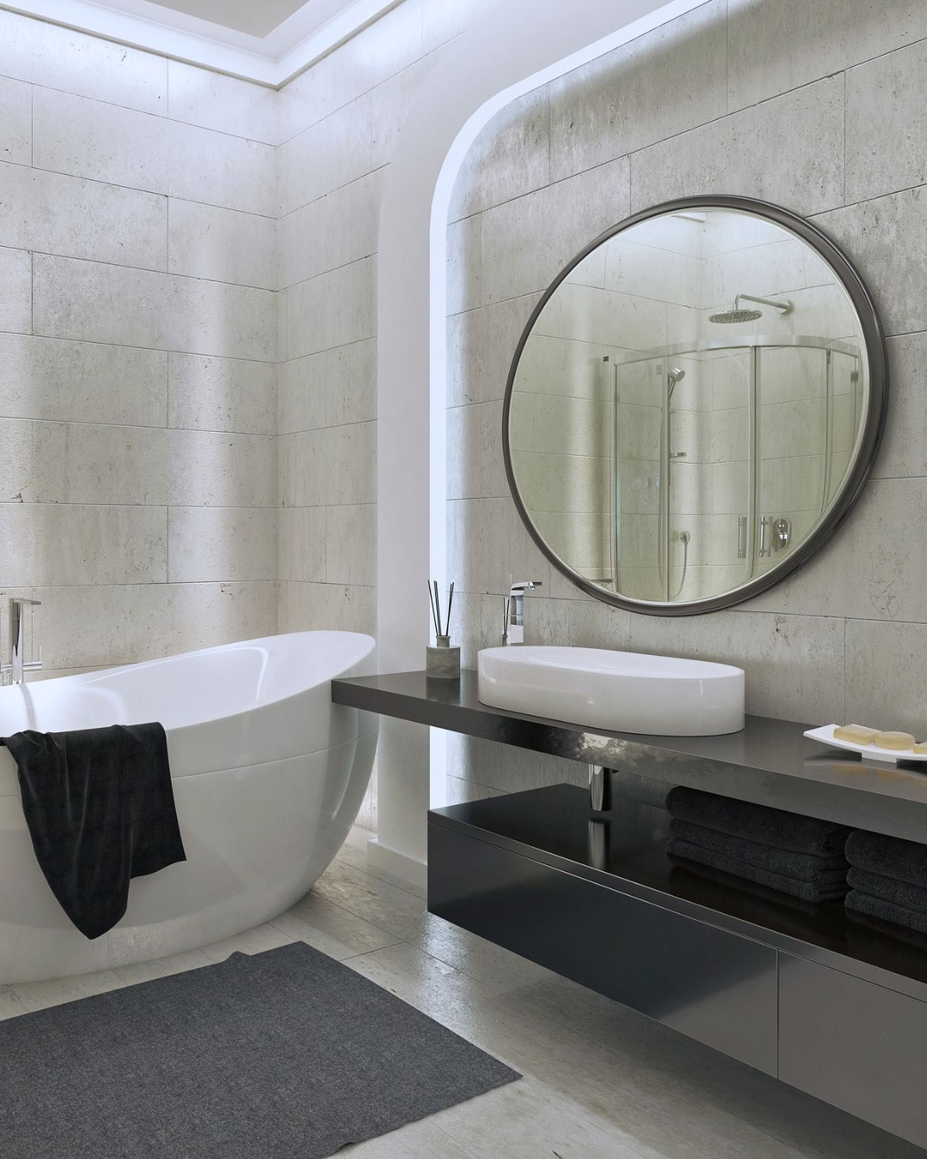 A bathroom with a bathtub , sink and mirror