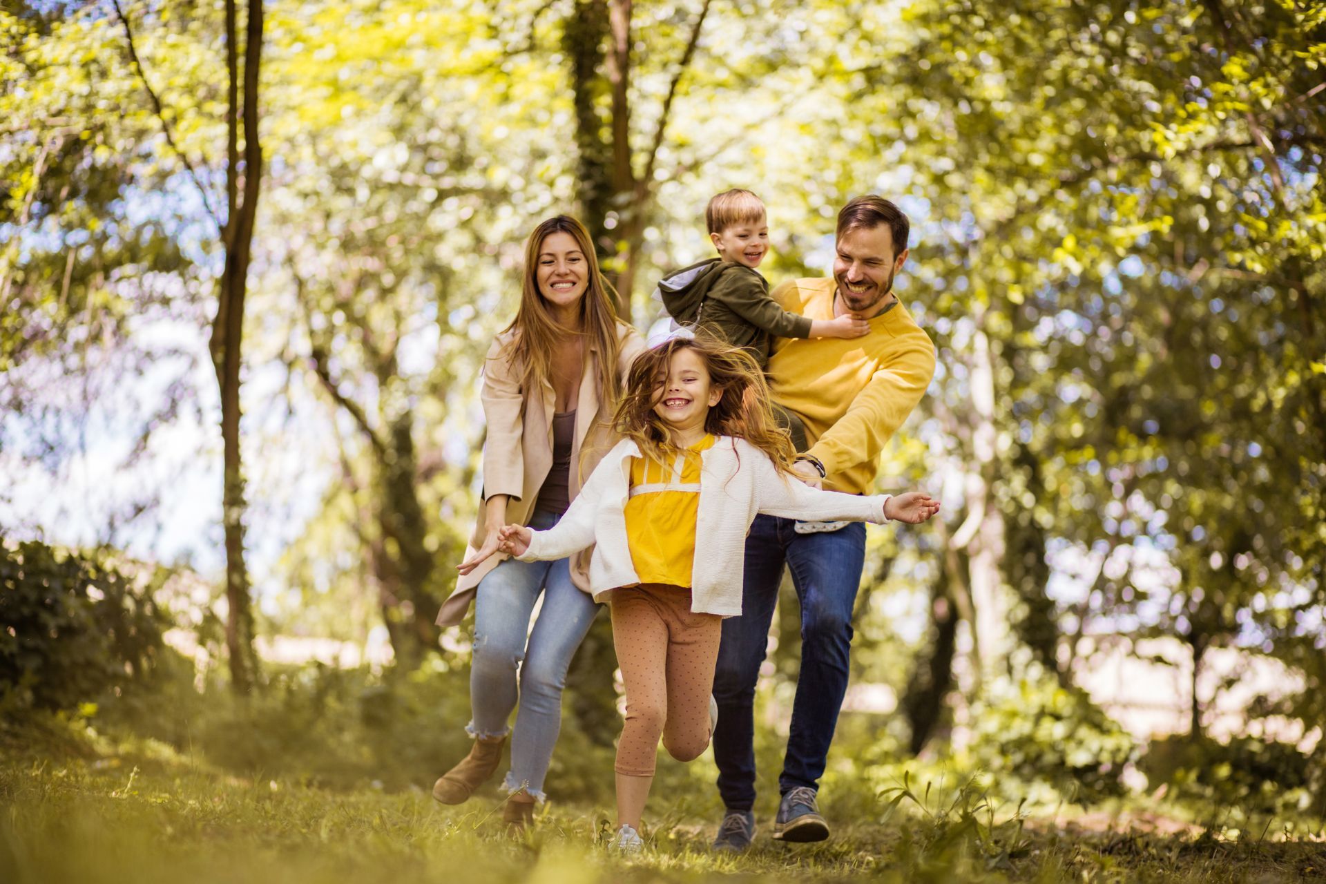 Smiling family walking together after loved one's release on bail Smiling family walking together after loved one's release on bail