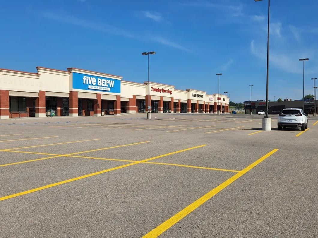 An empty parking lot in front of a store called safeway