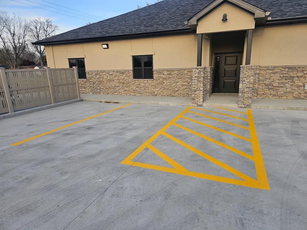 A building with a handicapped parking spot in front of it