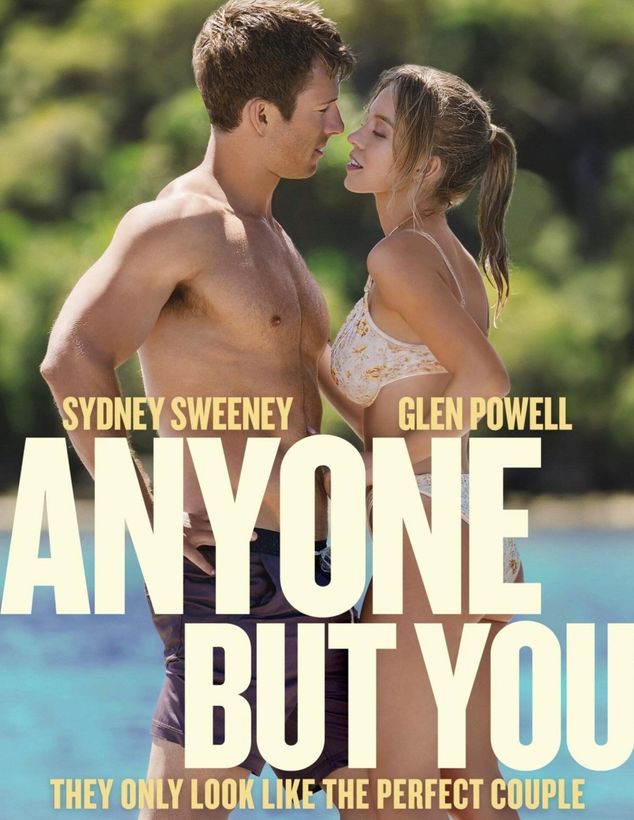 A movie poster with Sydney Sweeney and Glen Powell facing each other, looking romantic, on a beach.