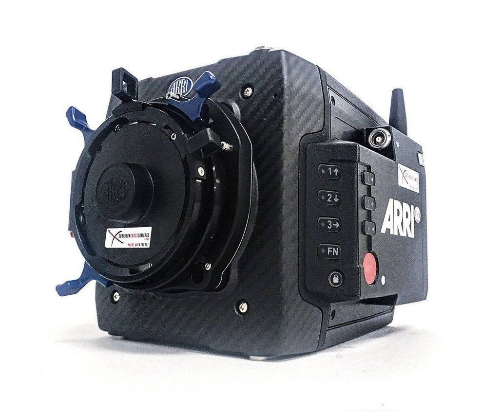 Black ARRI digital cinema camera with lens and accessories, isolated on white.