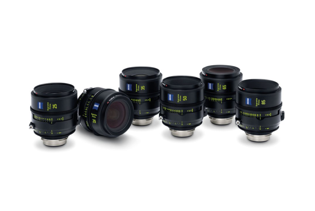 A set of six black and silver camera lenses on a white background.