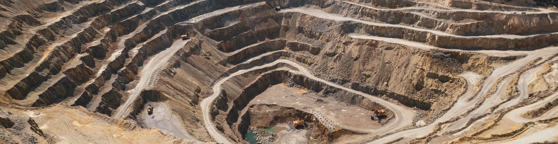 An aerial view of a large open pit mine. Natural Hydro excavation. 