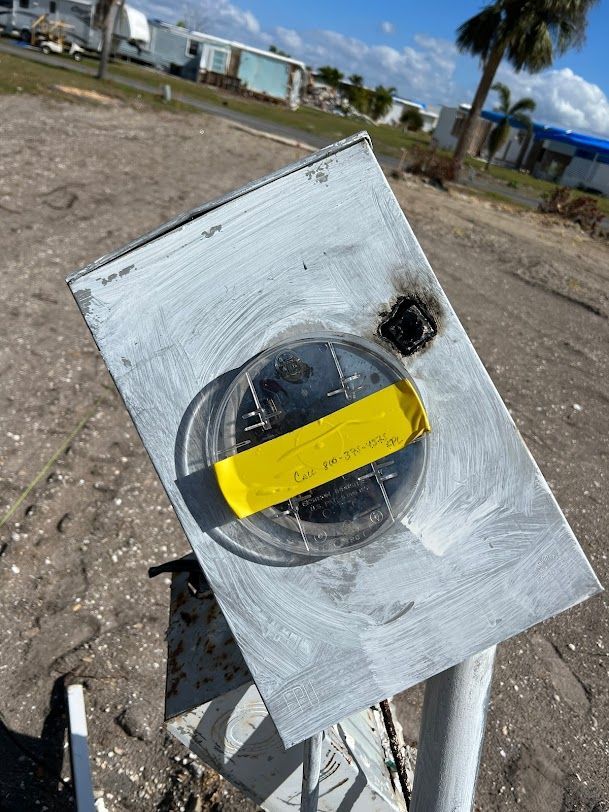 a close up of a meter with a yellow tape on it