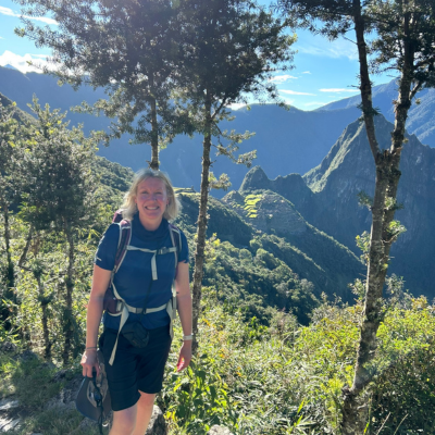 Julie Friend hiking in the mountains