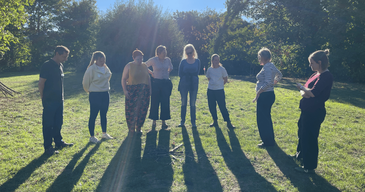 New group of volunteers stood outside in the sunshine at Dapdune Wharf