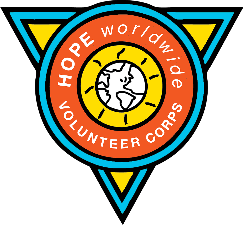 HOPE worldwide Volunteer Corps logo with a globe in an orange and blue triangle emblem