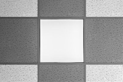 Gray tiled wall with a centered white square panel