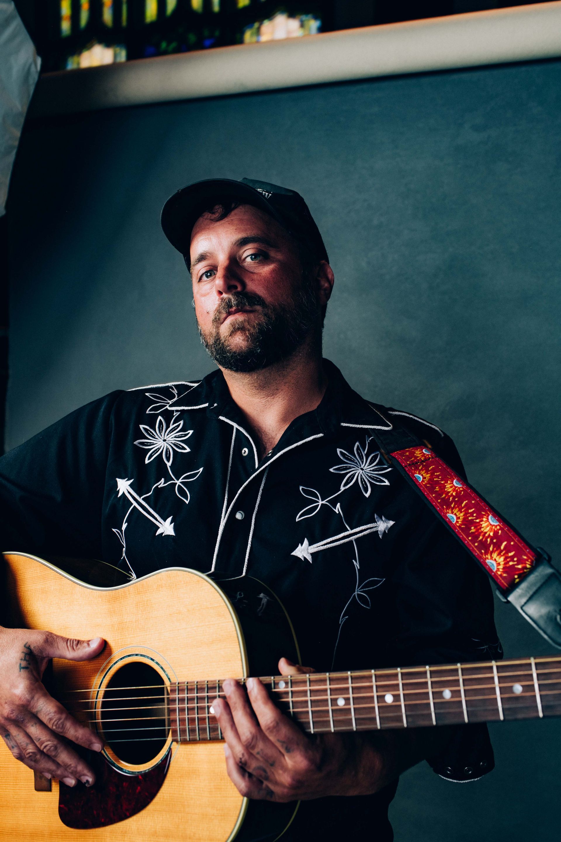 jo jo with guitar portrait photographed by asheville music photographer sandlin gaither at echo mountain studios