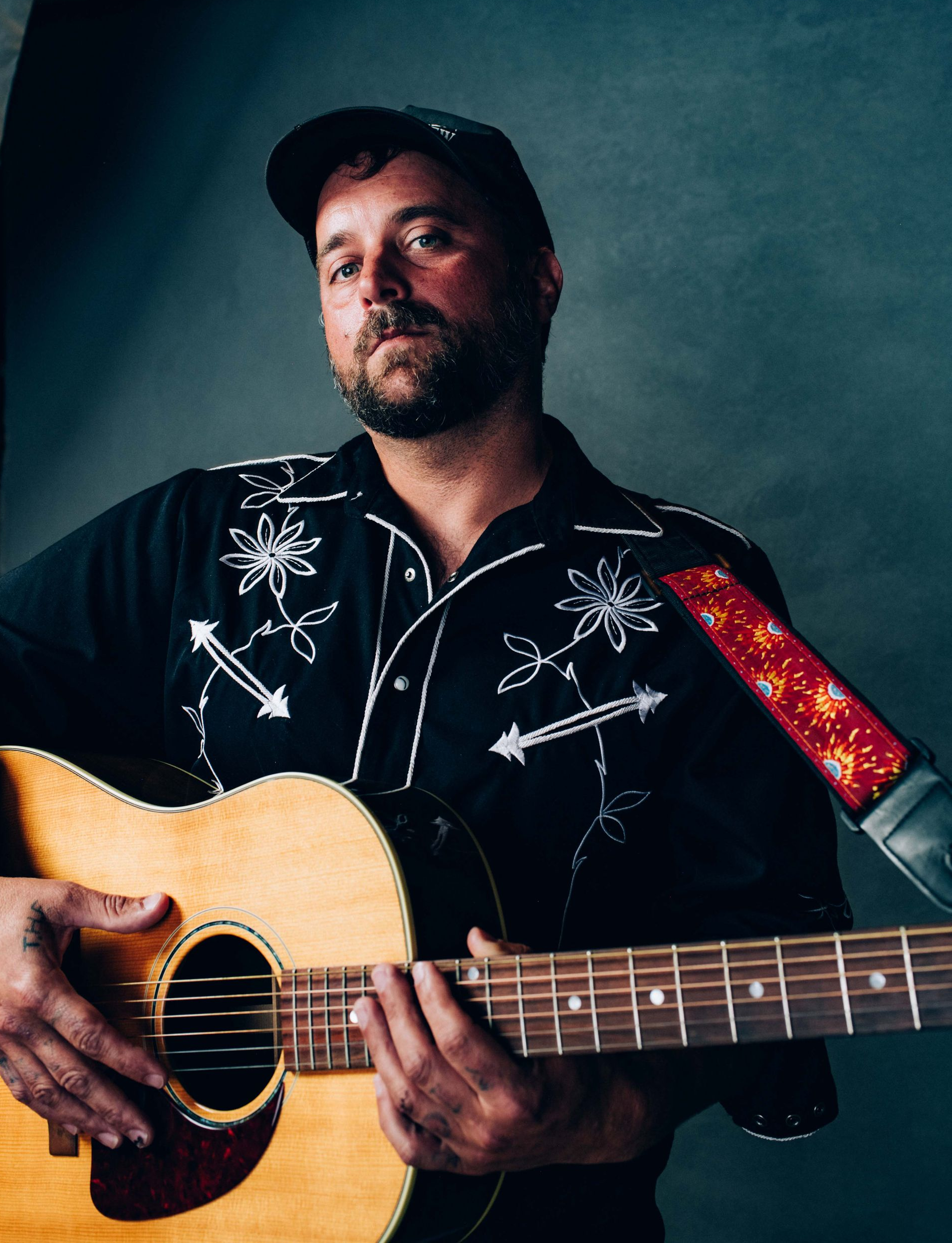 jo jo with guitar portrait photographed by asheville music photographer sandlin gaither at echo mountain studios