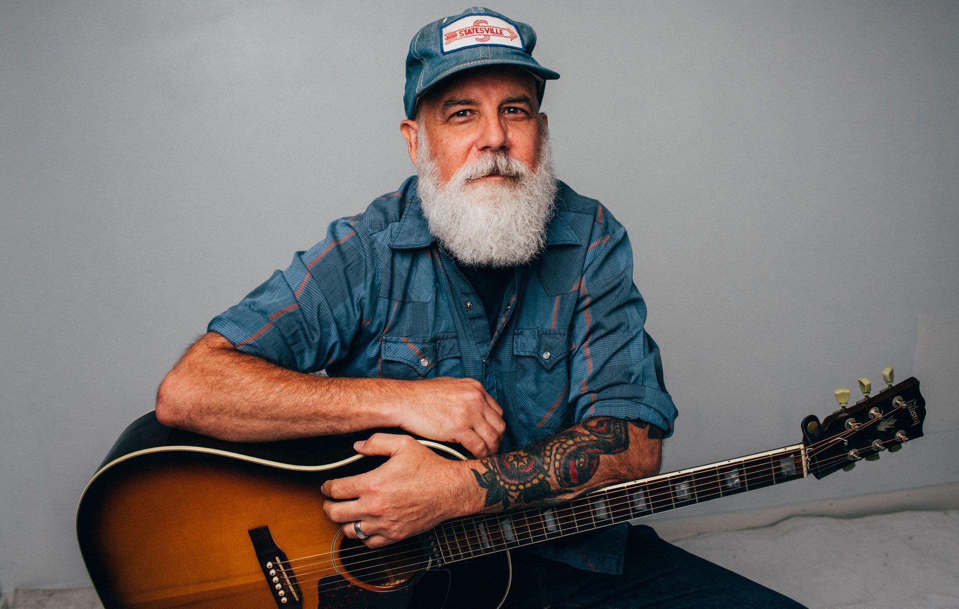 A Lee Edwards with guitar, Asheville music photo