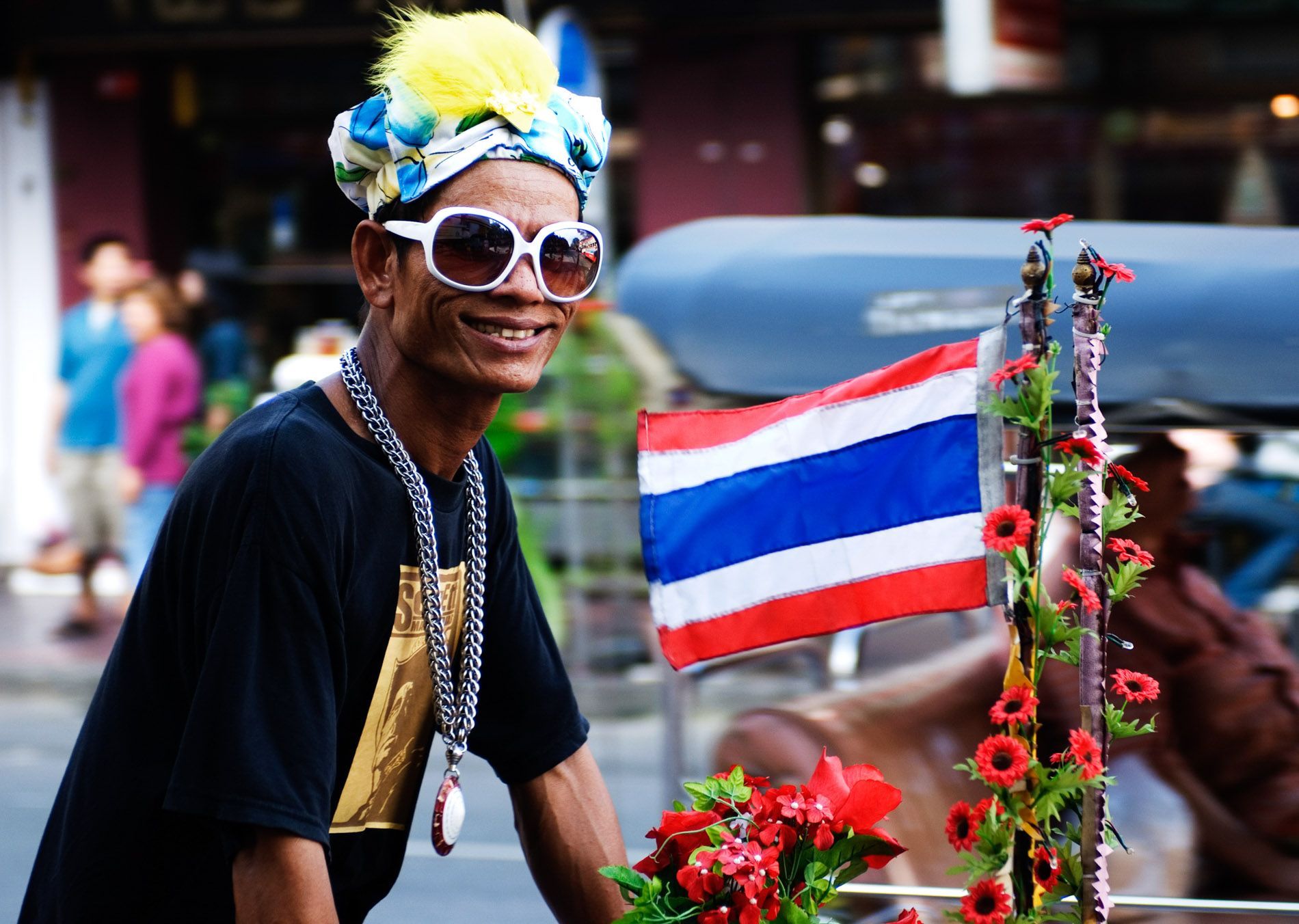 colorful bicycle man on the streets of Bangkok, Thailand, small group travel and food photography tours with Sandlin Gaither Explorer's Club