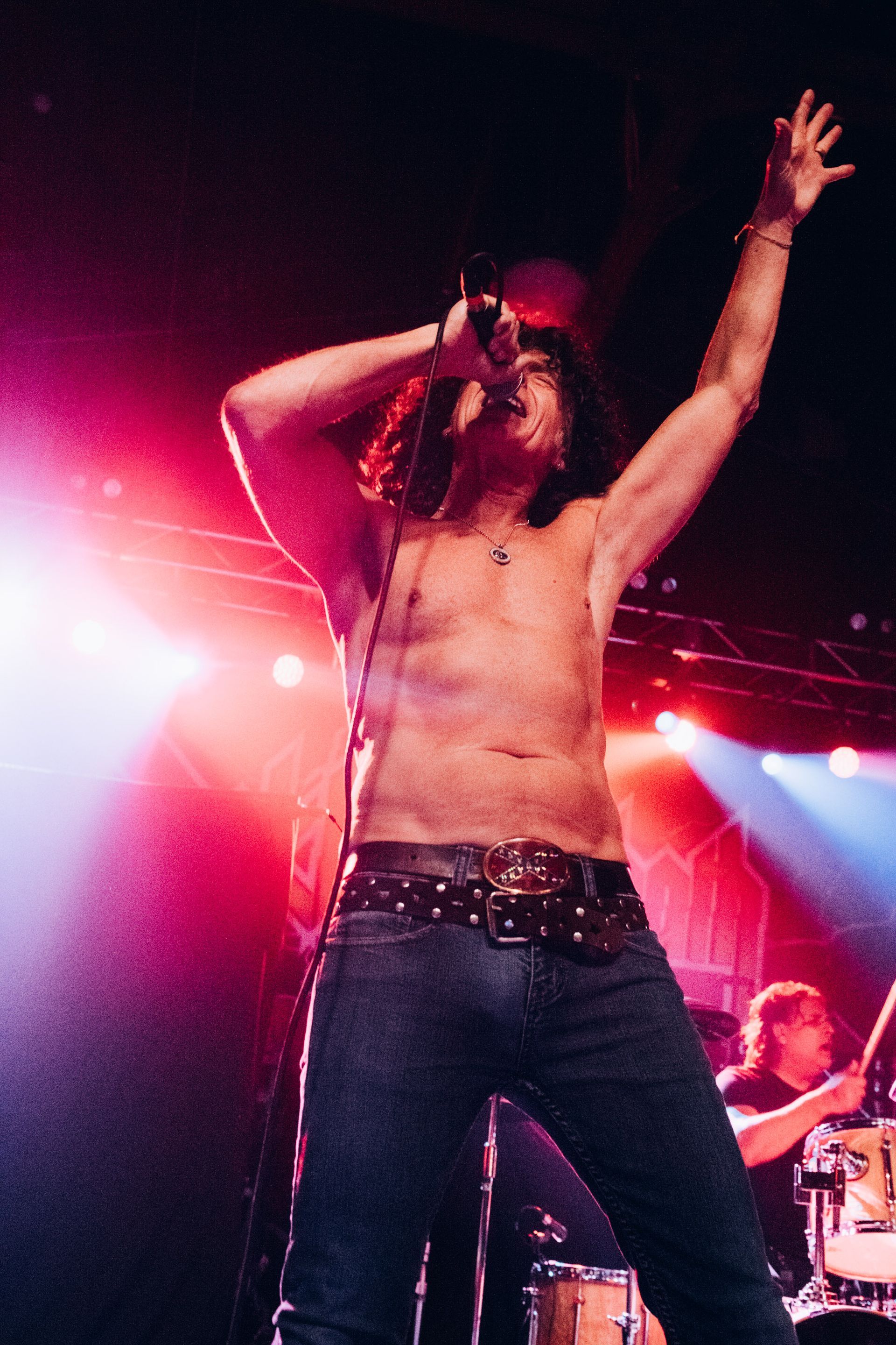 bonfire vocalist singer performs at the orange peel in Asheville, NC, photographed by music photographer Sandlin Gaither 