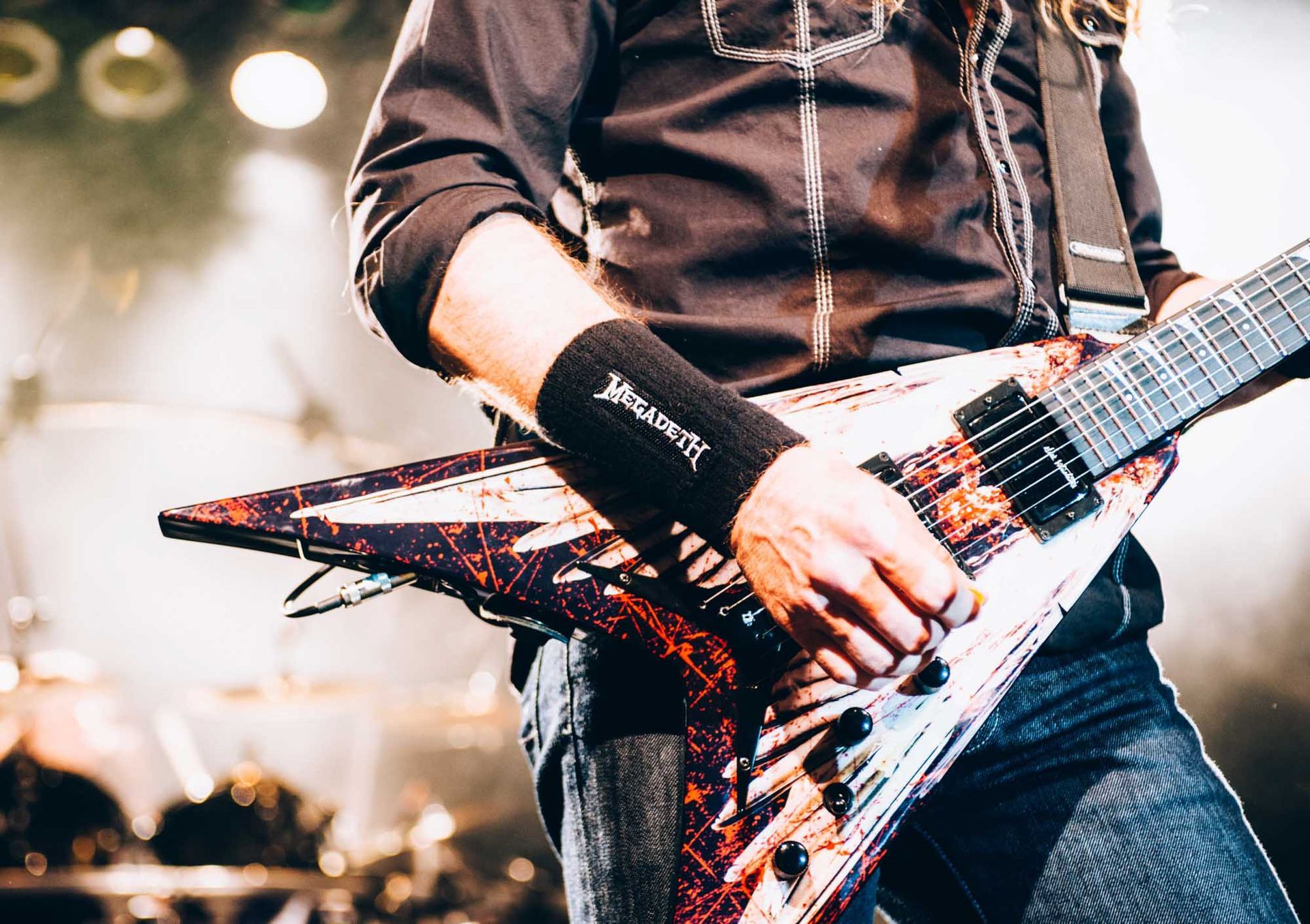 heavy metal guitarist Dave Mustaine, photographed live on stage at the Orange Peel in Asheville, NC by music photographer Sandlin Gaither 