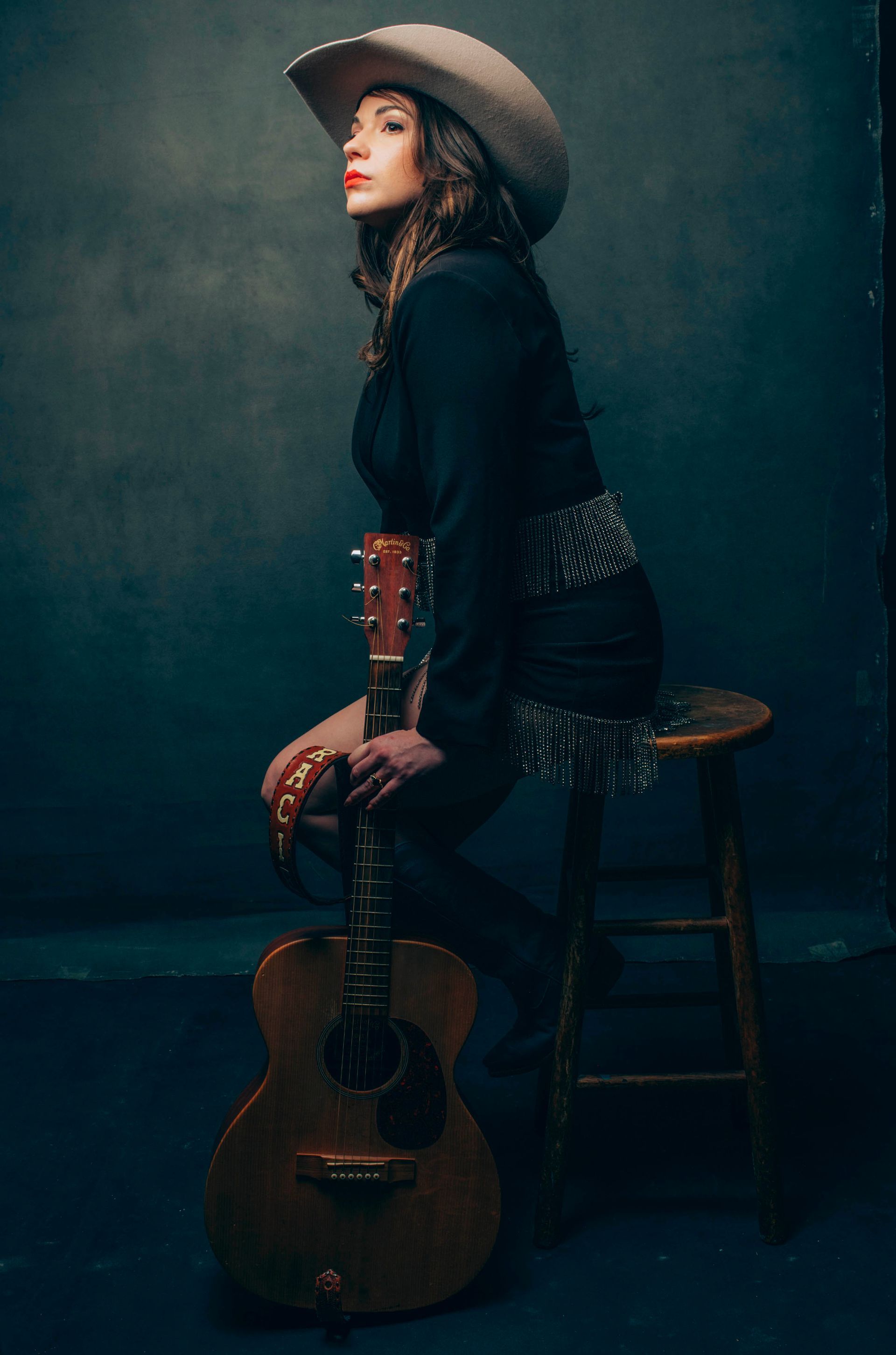 Gracie Lane, singer songwriter, poses for portrait in studio of Asheville, NC music photographer Sandlin Gaither 