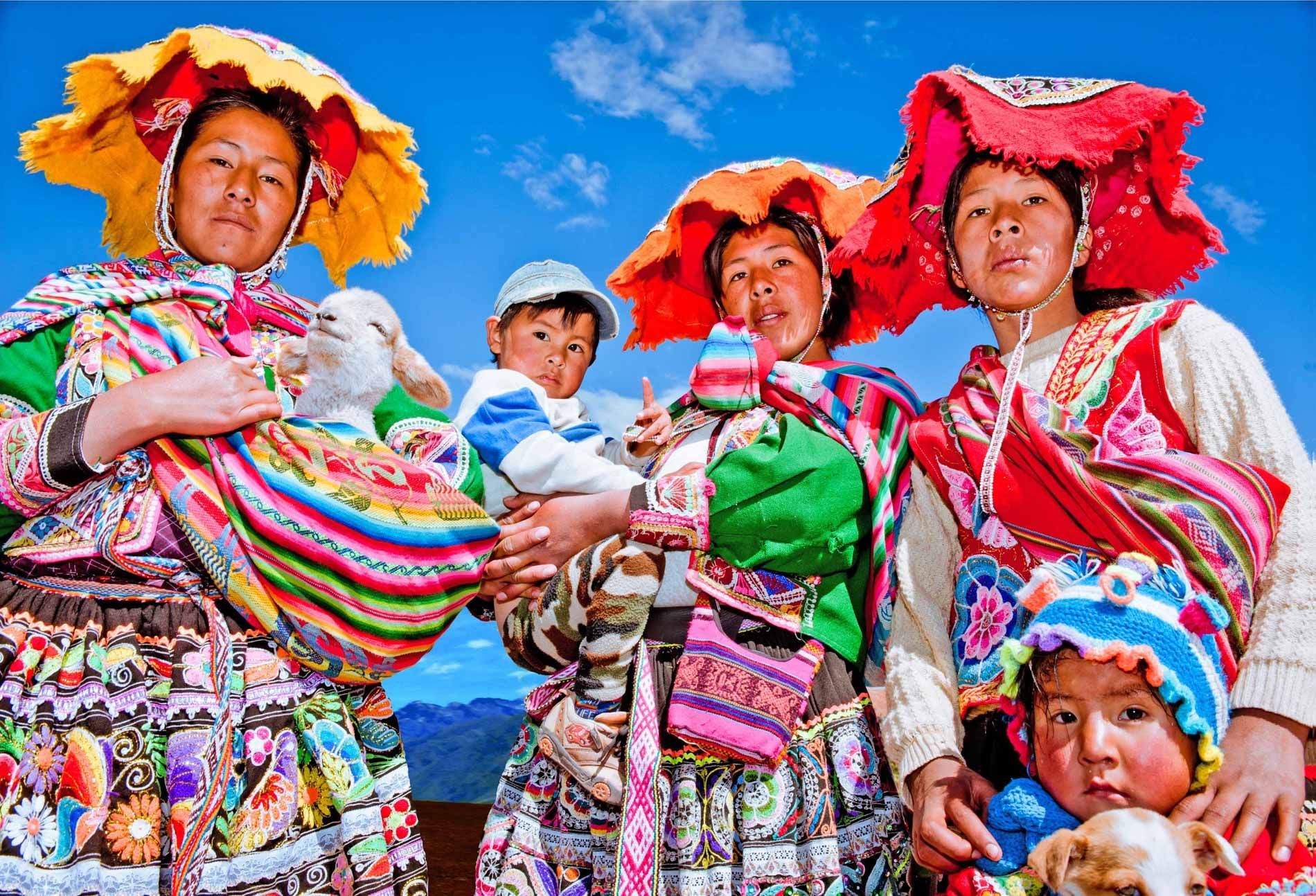 Women and children in native Peruvian attire — captured during photo tour in Cuzco.