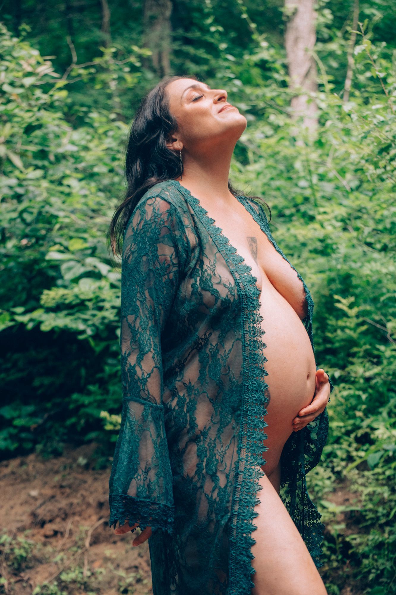 pregnant mother in maternity photography session in funky, trendy modern pose